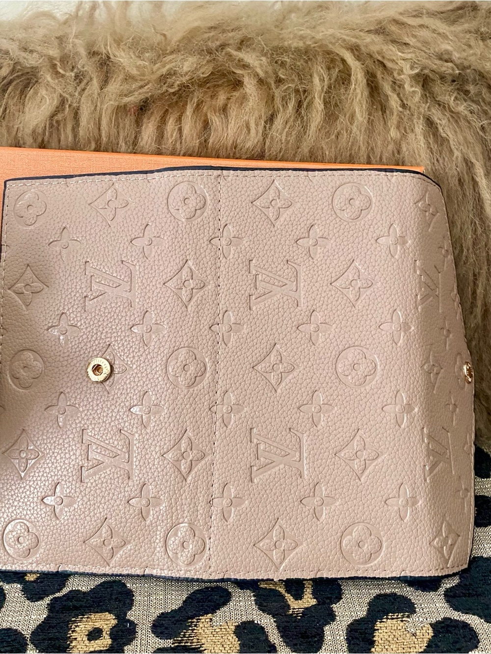Beige unbranded tri fold wallet with box